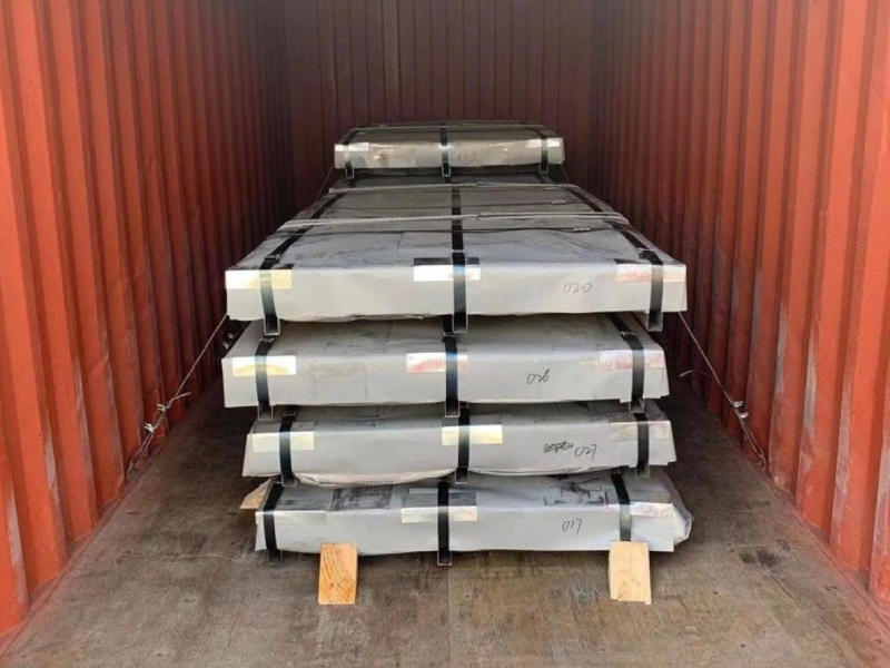 Supervised container loading of steel sheets for international export